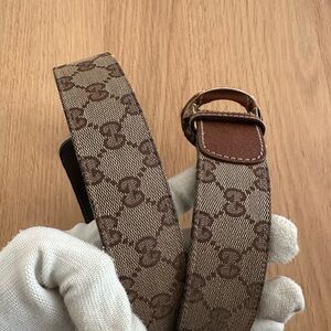Gucci Monogram belt with a bamboo-style G buckle